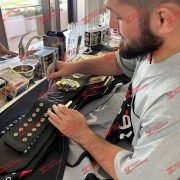 Khabib-Signing-Belt-1.jpg